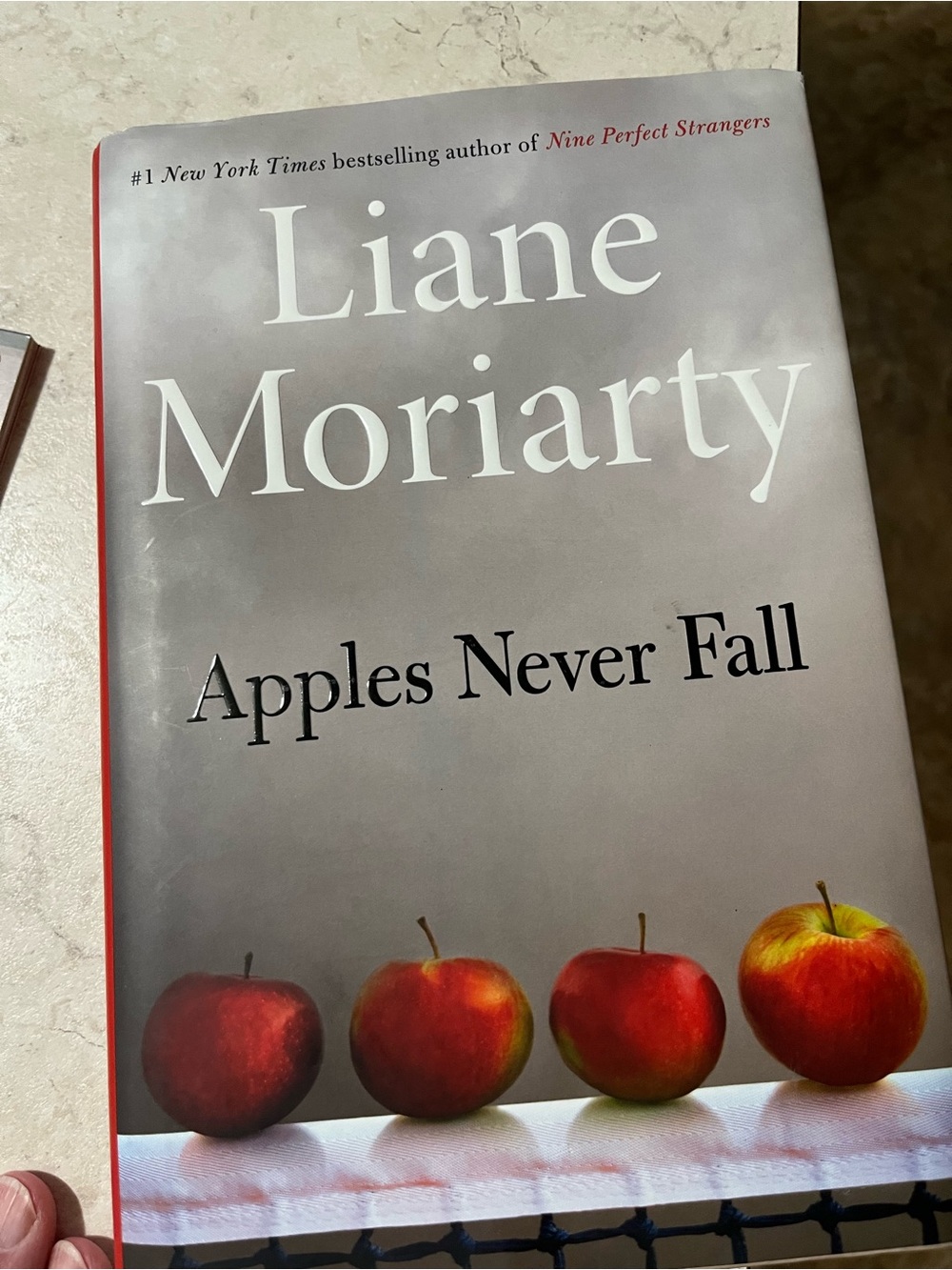 'Apples Never Fall' Hardcover Book